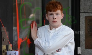 Extinction Rebellion activist glues himself to Brazilian embassy in London