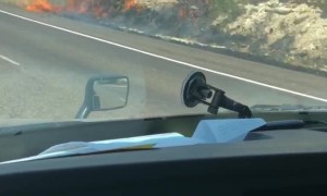 Truck Fire Spreads Along Shoulder