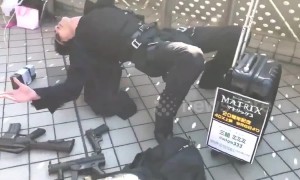Street performer does incredible Matrix bullet dodging pose at Japanese comic festival