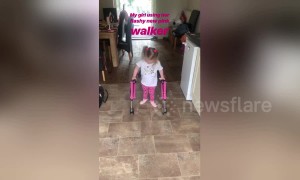 Little girl takes first steps after being told she could never walk