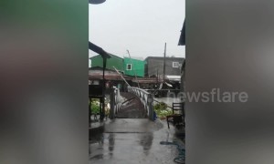 Floods wash away bridge in Philippines