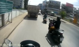 Motorcyclist Narrowly Avoids Oncoming Car