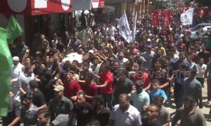 Funeral procession held for three Palestinians killed by Israeli shellfire in Gaza