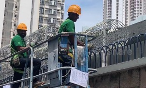 Razor wire installed at Hong Kong police station