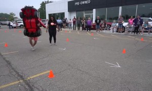 Man Takes Mini Car Race Into Own Hands, Fails