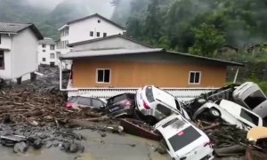 Strong rainstorm sees floods and mudslides wreck Chinese city, killing eight people