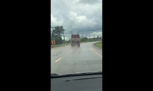Broken bus drives diagonally on Thai motorway