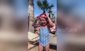 Adorable moment UK girl couldn't find her goggles that were on her head the whole time