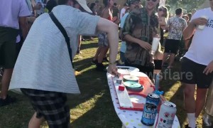 Man baffles UK festival-goers by DJing on an ironing board
