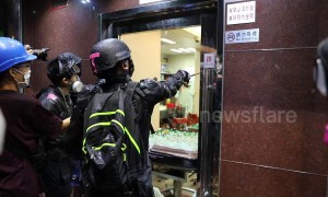 Hong Kong protesters destroy property they believe belong to triad gangsters
