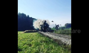 Crazy train! Incredible moment man does loco flip over moving locomotive