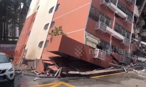 Six-storey residential block topples over onto another building in China's Shenzhen
