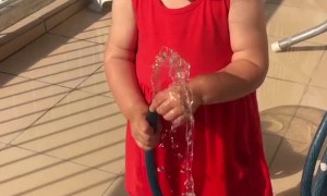 Plays with Hose, Gets Water in Her Nose