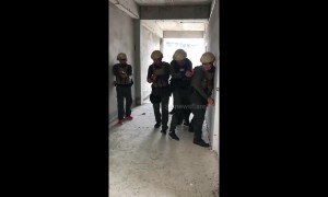 Hilarious moment bungling cop accidentally bounces grenade off wall