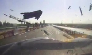 Tyre smashes into car on Chinese highway after falling off truck
