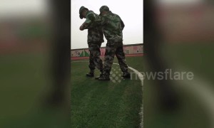 Chinese student is unable to coordinate his arms and legs during military training drill