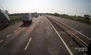 Lorry fails to stop after smashing into parked truck on UK motorway
