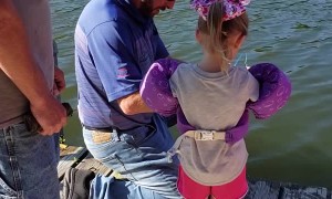 Little Girl Reels in Monster Fish with Mini Pole