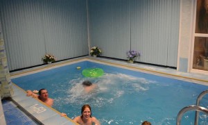 Dude Squeezes Through Pool Toy