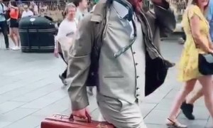 Street Performer Stuck in Time