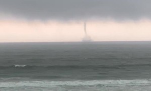 Friends Watching a Waterspout
