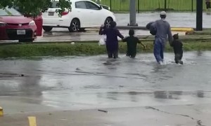 Massive Puddle Surprises Pedestrians