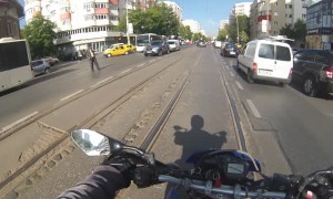 Biker Helps Senior Citizen Cross the Street