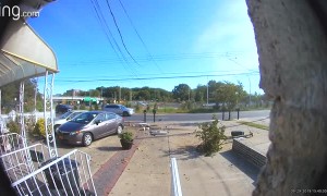 Car Slides into Two Parked Cars