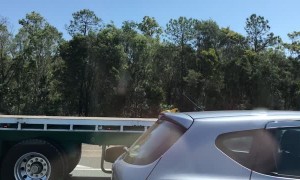 Big Truck Carries Tiny Load