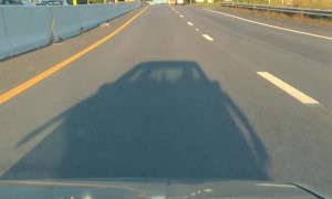 Truck Runs Along Road