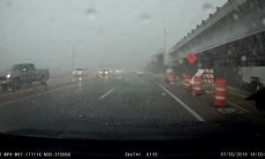 Sign Slams Car in High Winds