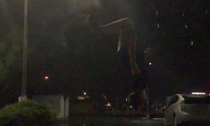 Landing a Backflip as the Lightning Strikes
