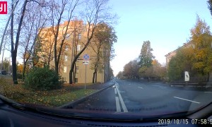 Tight Squeeze Sends Sedan on its Side