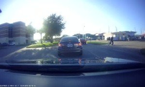Cyclist Inches from Disaster