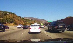 Helicopter Helps Extinguish Getty Fire Flames