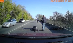 Man Falls Out of the Back of a Moving Van