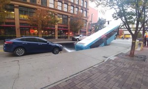 Sinkhole Swallows Up City Bus