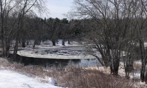 Floating Ice Disc Spins in Circles