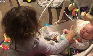 Big Sister Teaches Baby Brother How to Sign