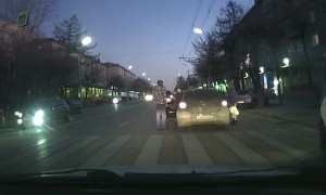 Pedestrian Pummelled by Car at Crossing