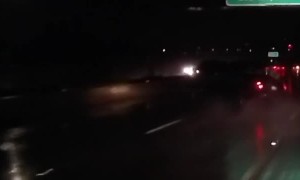 Car Spins Out on Slick California Freeway