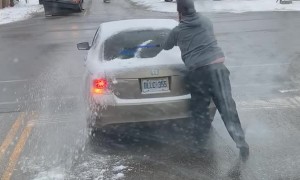 Guy Cleans Off Someone Else's Car Window