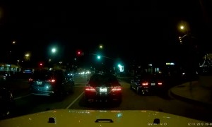 Car Drives Along Parking Lane into Parked Cars