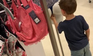Curious Kid Investigates Mannequin