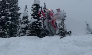 Snowmobile Jump Leads Directly Into Tree