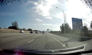 Driver Deftly Dodges Fallen Ladder on Freeway