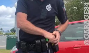 Perturbed Police Man Doesn't Like Driver's Phone