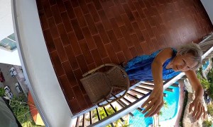 Lucky Base Jumper Gets Caught on Balcony