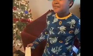 Boy Bamboozled by the Packaging