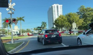 Express Train Slams Car at Crossing